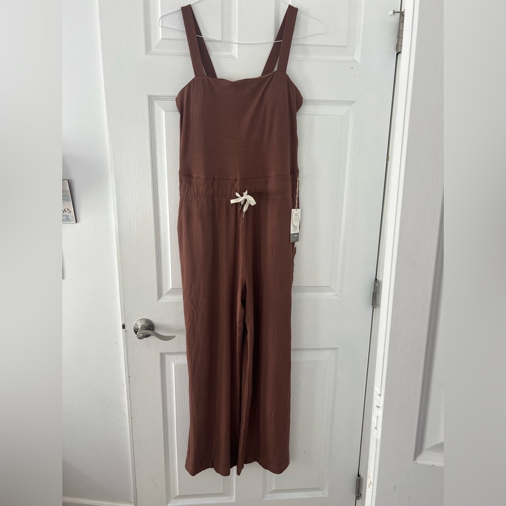 Hazelnut colored Vuori jumpsuit. Brand new with tags!